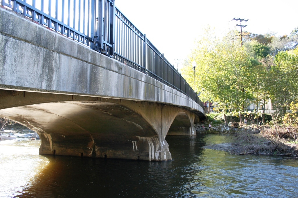 a roadway and pedetrian bridge over the Patabsco River in historic Ellicott City Maryland