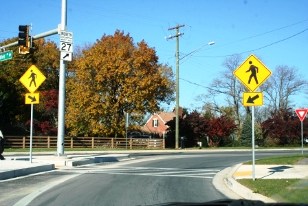 New Montgomery County road connection to SHA highway with ADA Pedestrian and Signalizied Crossing